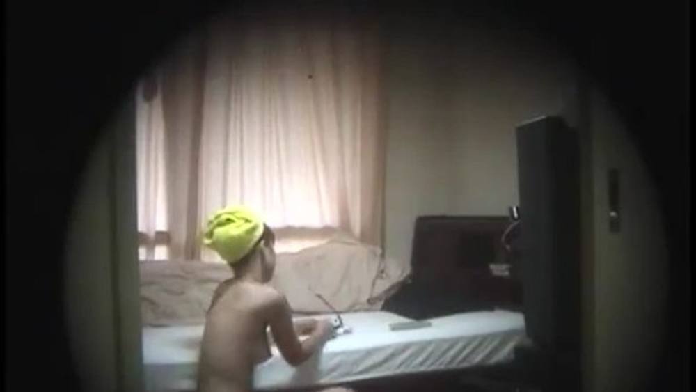 A hidden camera sneaks into the room of a girl living alone!