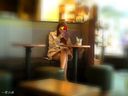 A beautiful college girl who was having tea at a café was cute and observed her face and beautiful legs