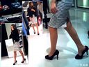Beautiful leg lady with a slit skirt in a prickets is irresistible and follows up observation