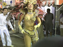 Passionate samba beauty dances crazy drenched in sweat in exhibitionism