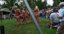 make a fuss at an event where nudists gather!