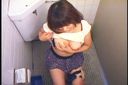 College girl crazy about masturbation in a public toilet