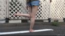 Barefoot fetish barefoot girl on asphalt road or back alley