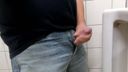 Masturbation with a sticking out of no-pan jeans in the toilet
