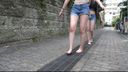 Barefoot fetish barefoot girl on asphalt road or back alley