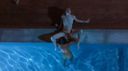 A great lesbian video in which a Caucasian beauty and a Spanish beauty play with each other's genitals and deeply kiss each other in the outdoor pool in the middle of the night!