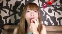 Gentle amateur college girl licking and chewing fruits, vegetables, and candy from brood rice crackers