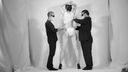 A nude photo session by a tall woman and two men