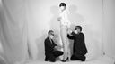 A nude photo session by a tall woman and two men