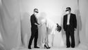 A nude photo session by a tall woman and two men