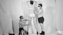 A nude photo session by a tall woman and two men