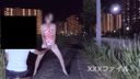 On the street of the big city at night, a fair-skinned shaved married woman stands in the back and vaginal shot and drips white liquid