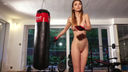 Beautiful woman kickboxing naked