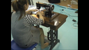 Foot treadle sewing machine pedal depression and crash