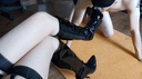 Queen's sensual high heeled boots and silk stockings footjob