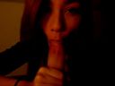 A cute Asian gal licks up a big earnestly