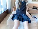 Innocent beautiful girl in modern student uniform and plug