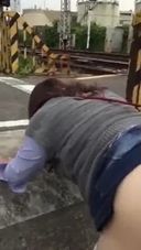 A perverted video of an ordinary married woman passing a train in front of a railroad crossing at the same time