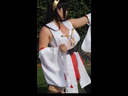 Priestess cosplay with white bra sticking out