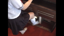 Reed organ pedal in dirty shoes of female student