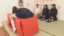 One student of the tea ceremony club who makes tea while his during the tea ceremony club