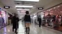 A hairdresser and single mother shows off to multiple passengers by exposing her butt on trains and stations for income.