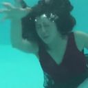 A beautiful mature woman is crazy in the pool w