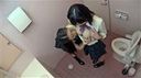Schoolgirls immersed in lesbian acts in the girls' toilet