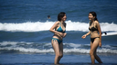 Women happily playing at the beach (3)