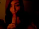 A cute Asian gal licks up a big earnestly