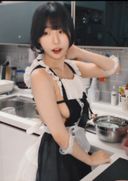 Beautiful girl naked apron cooking