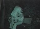 A famous park couple infrared in the middle of the night (1) Man and woman wriggling in the dark