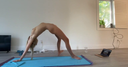 Beautiful woman naked yoga at home 2