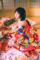 Beautiful girl like a Japan doll with gorgeous kimono and lustrous skin