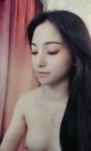 A slender Chinese beauty with fair skin masturbates violently with a!!