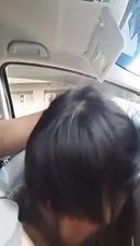 Woman giving in car in the daytime