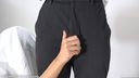 Female hand touching men's pants F656