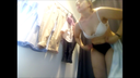 Caucasian woman changing clothes in the fitting room! Bra and pants are fully photographed.