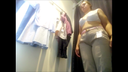 Caucasian woman changing clothes in the fitting room! Bra and pants are fully photographed.