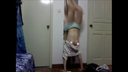Half female college student's handstand chest with flickering nipples