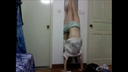 Half female college student's handstand chest with flickering nipples
