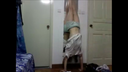 Half female college student's handstand chest with flickering nipples