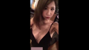A sexy Chinese hostess is serving customers with a lot of breasts.