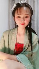 Milking selfie of woman in Chinese costume