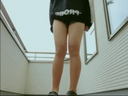 Exhibitionist play in which a girl takes off her clothes on the balcony of her parents' house