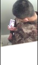 Secretly filming a soldier's toilet masturbation