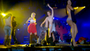 Amateur women are fully nude on the stage of the concert venue...