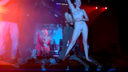 Amateur women are fully nude on the stage of the concert venue...