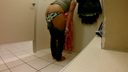 A woman masturbating in a selfie in the fitting room!