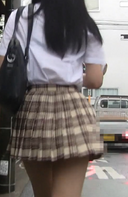 From behind.
